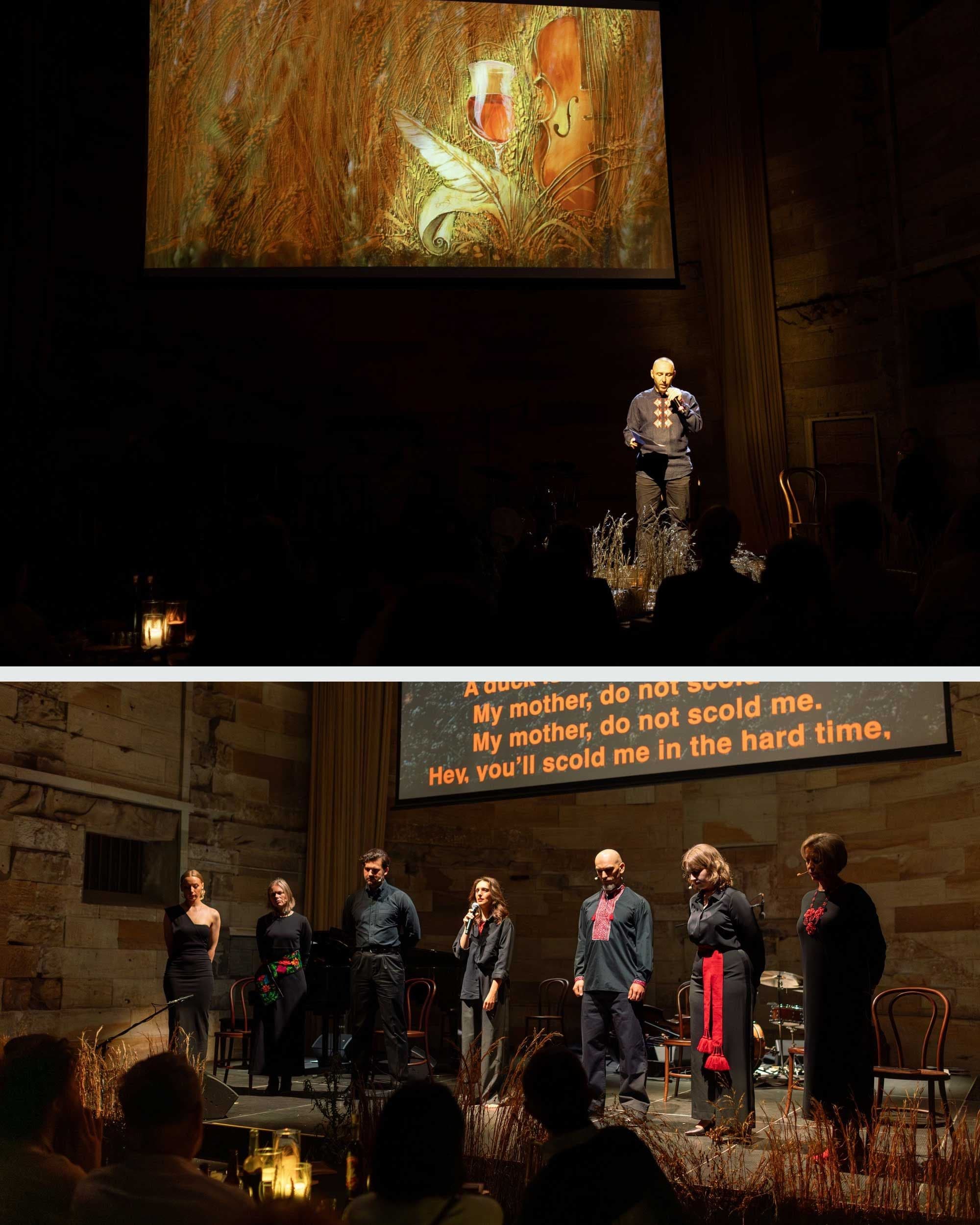 Performers on stage with screen behind