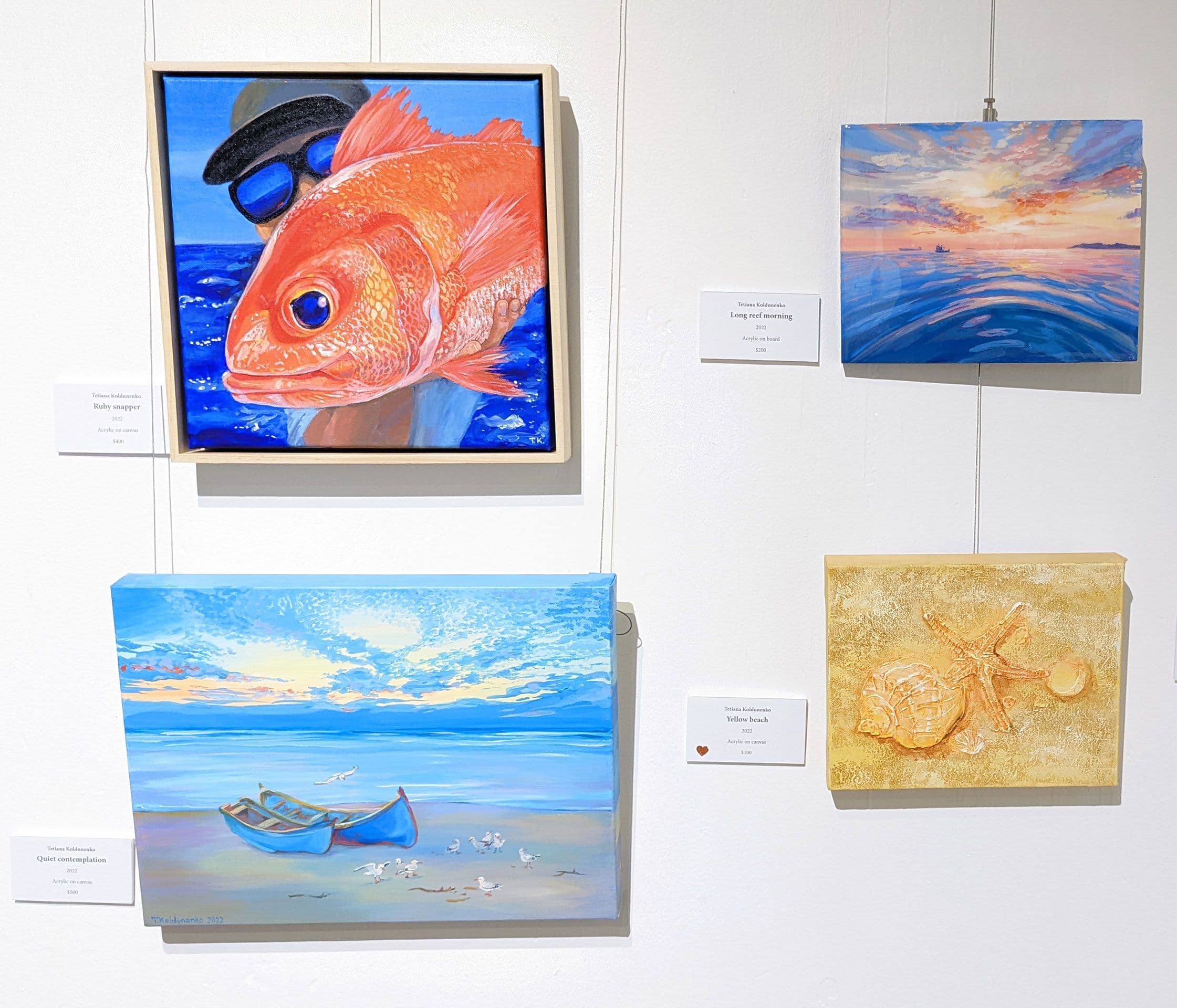 Artworks of the contemporary Australian artist Tetiana Koldunenko on the wall