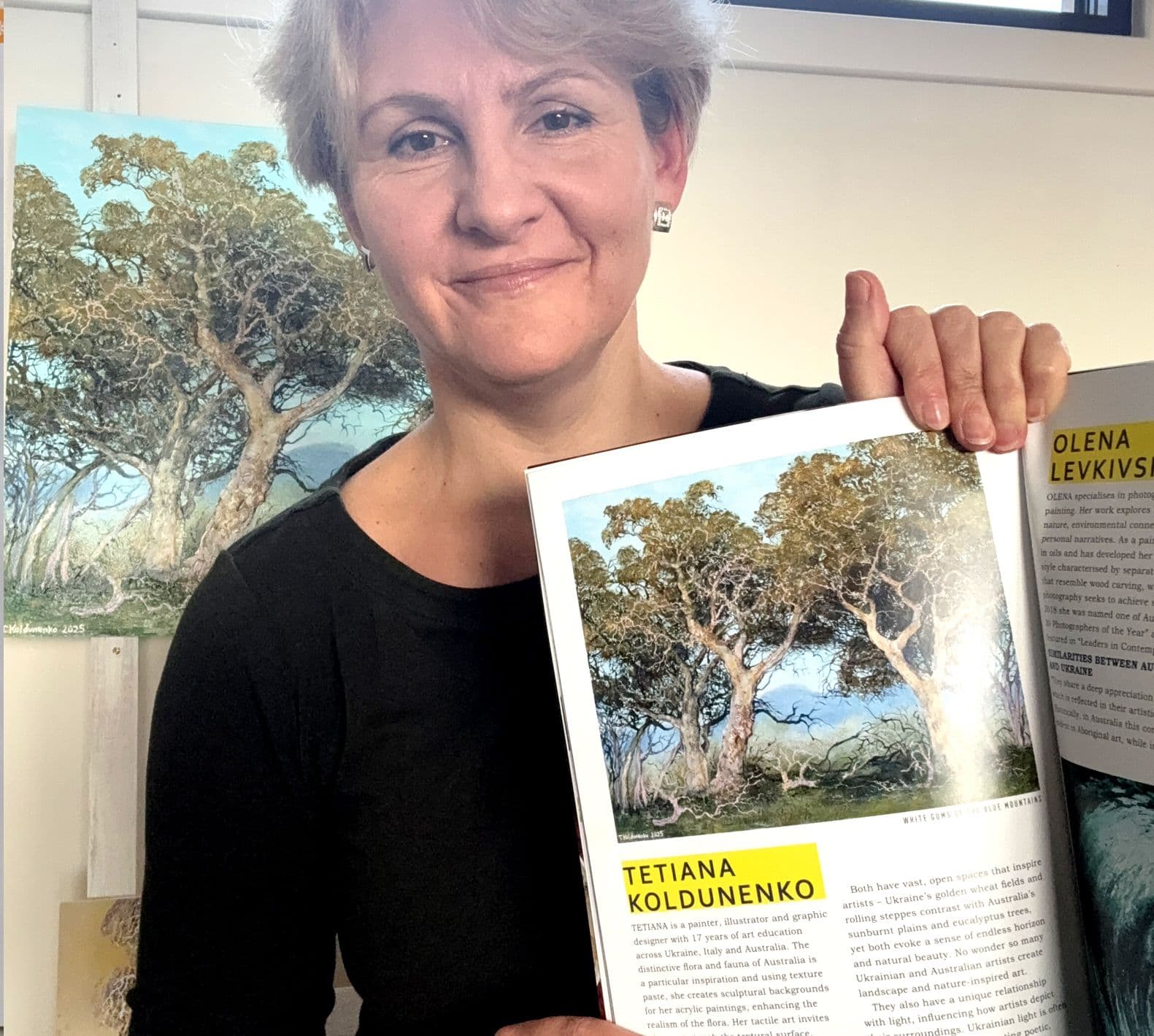 Artist with magazine in her hands